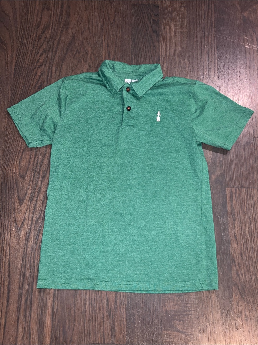 Kids Green Polo with White Tree Emblem Size- M - 10/12